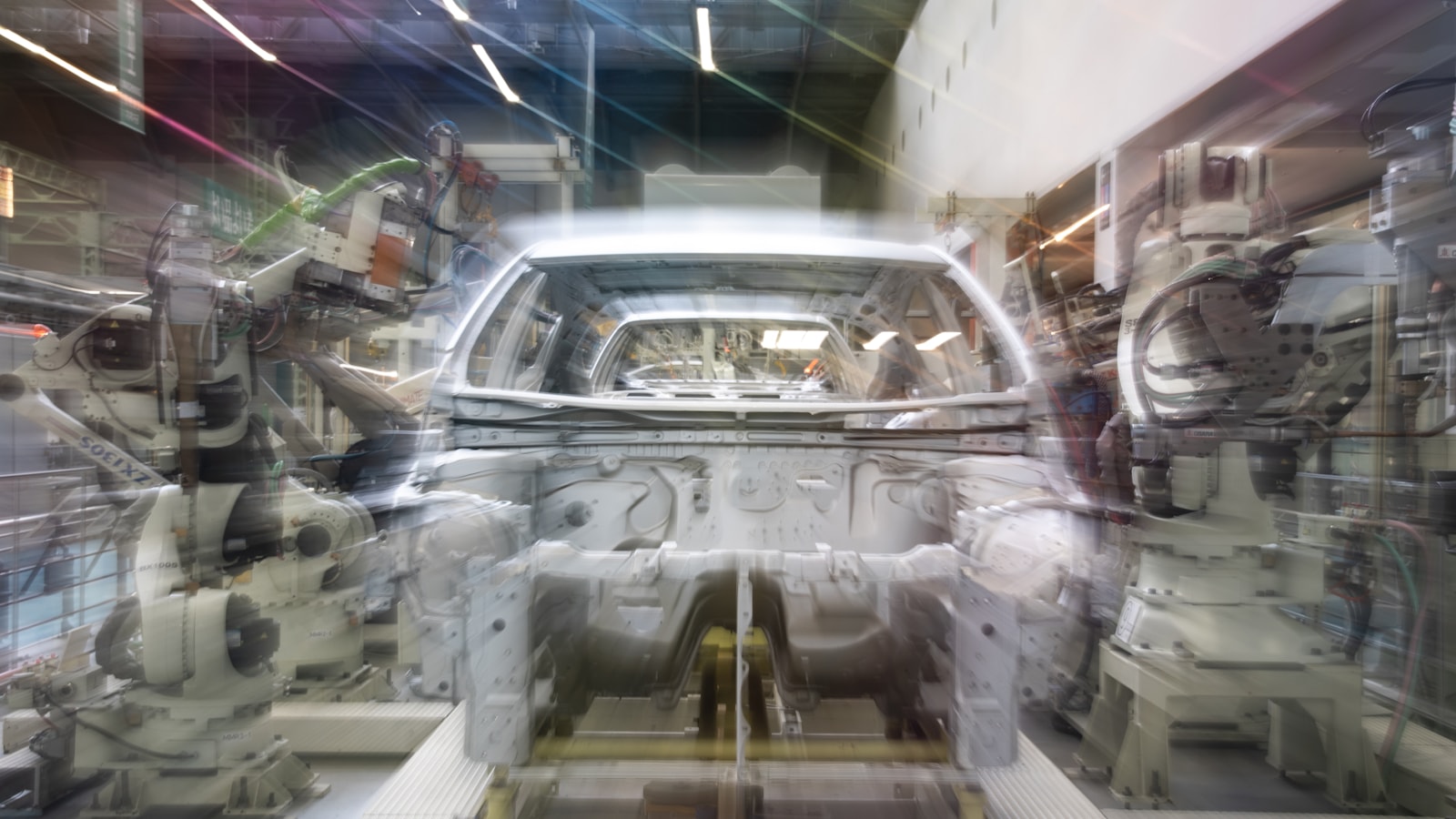Automotive body shell moving through an automated production line