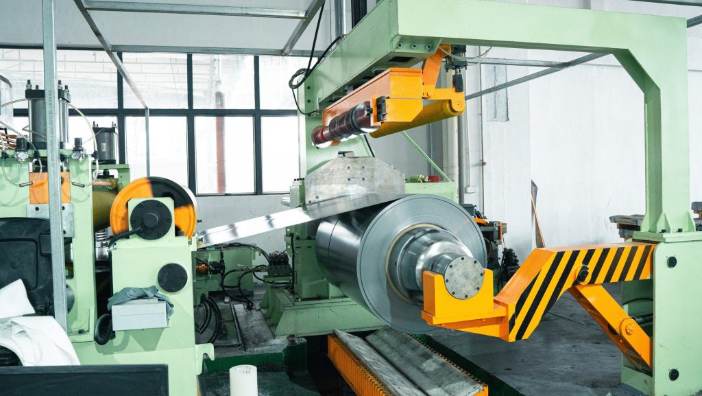 Recoiler mandrel winding separated strips on a RONGXING coil slitting line