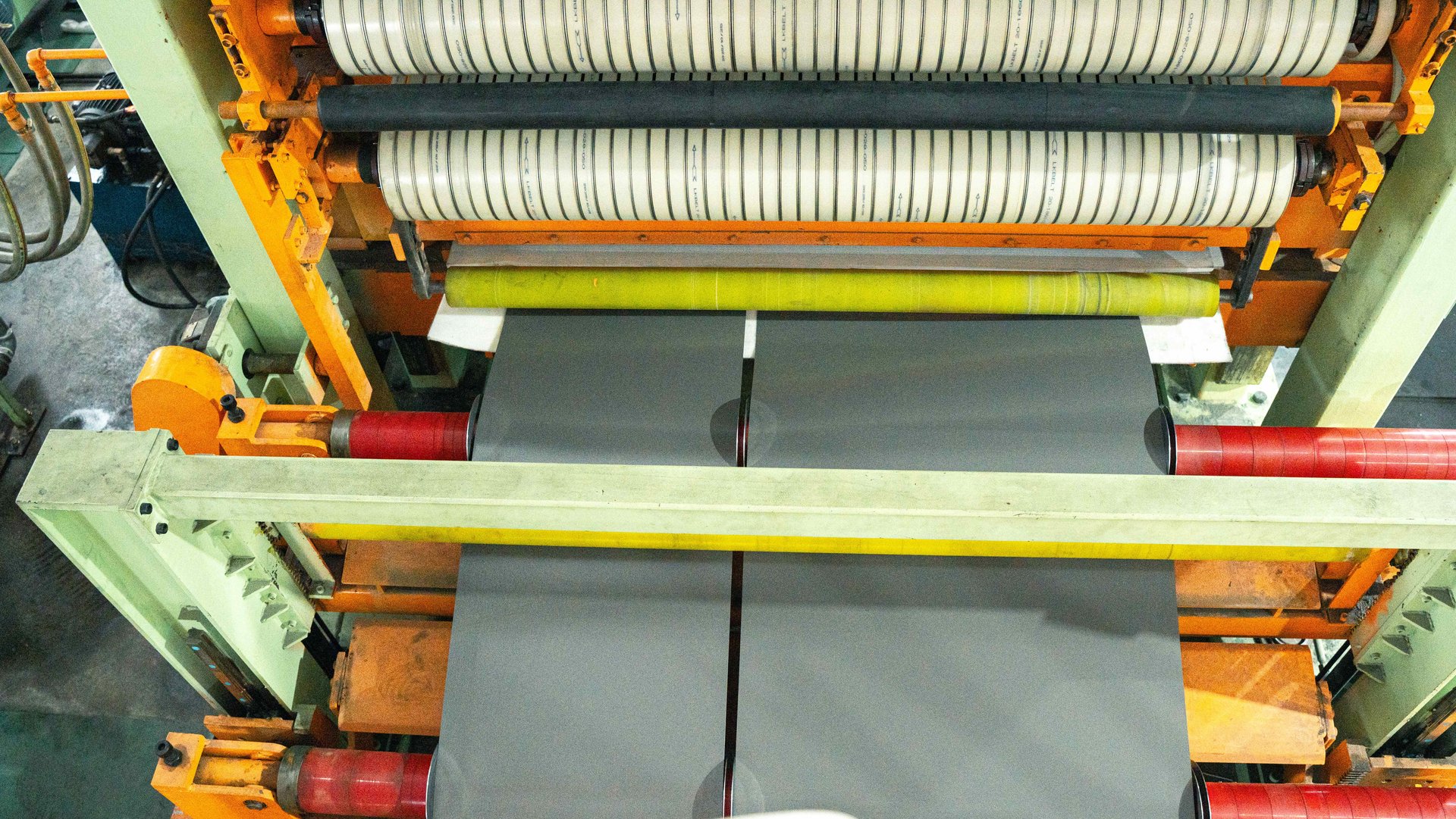 Separated strips passing through contact and separator rolls