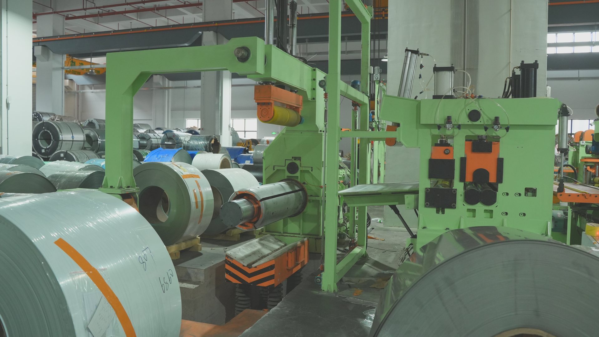 Coil loading and entry equipment