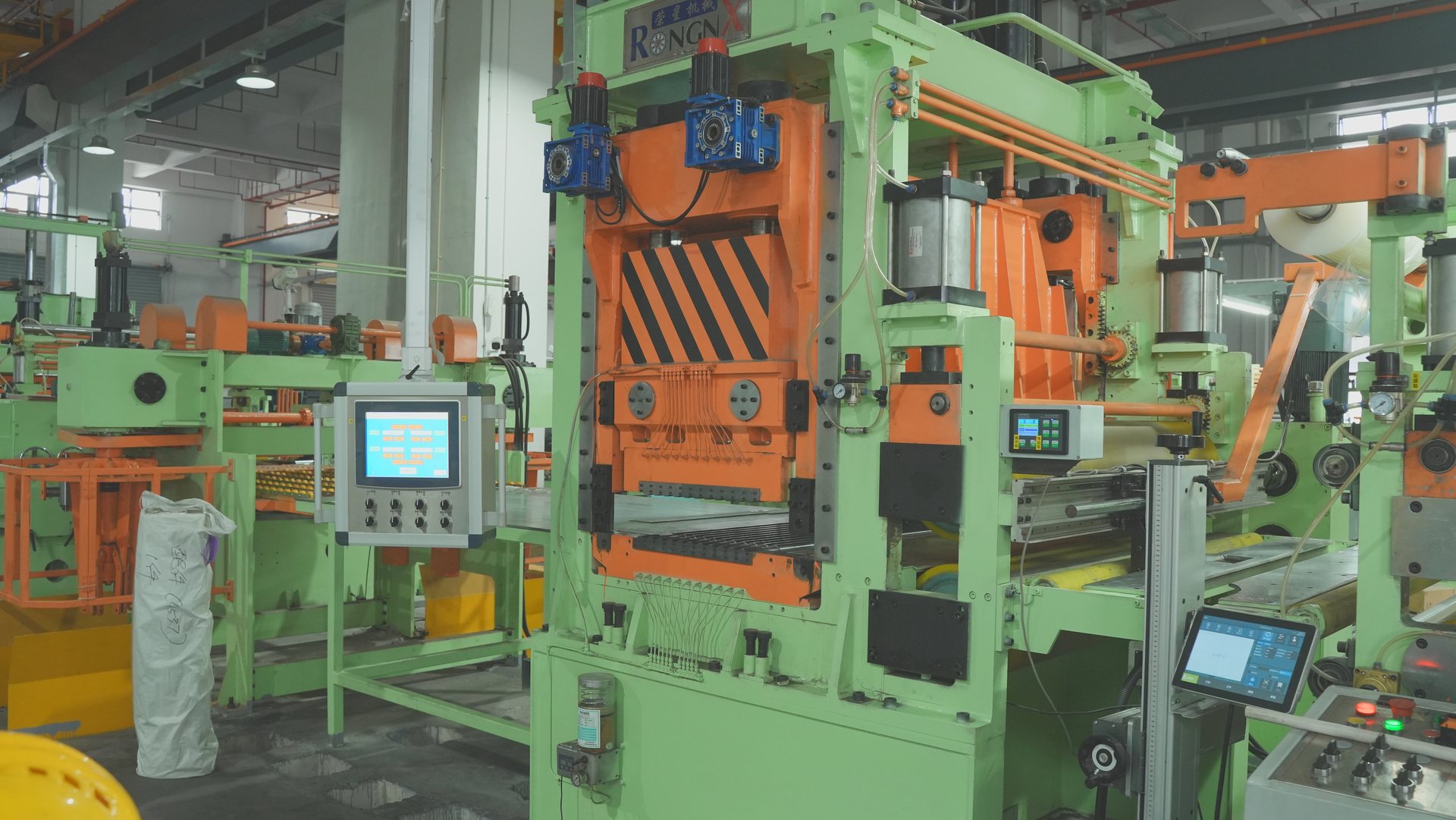 Coil-to-sheet processing section and control stations