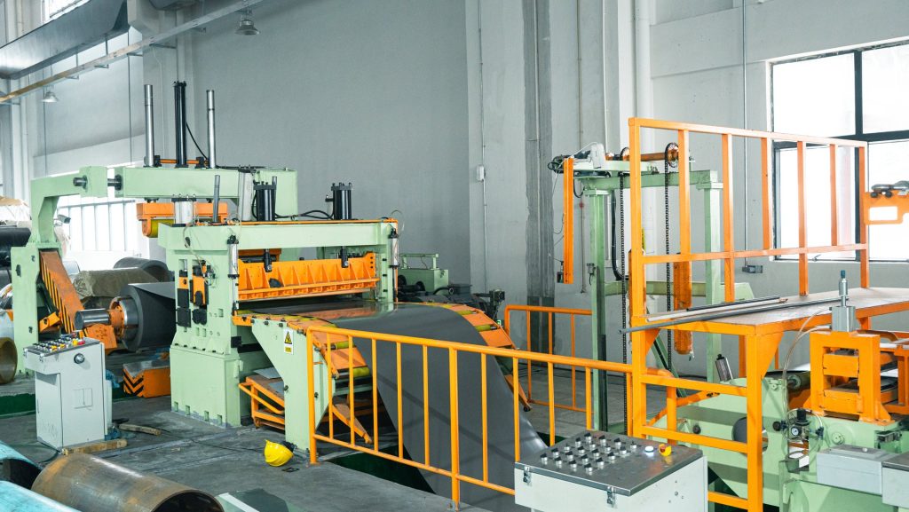 Coil slitting line entry and loop section